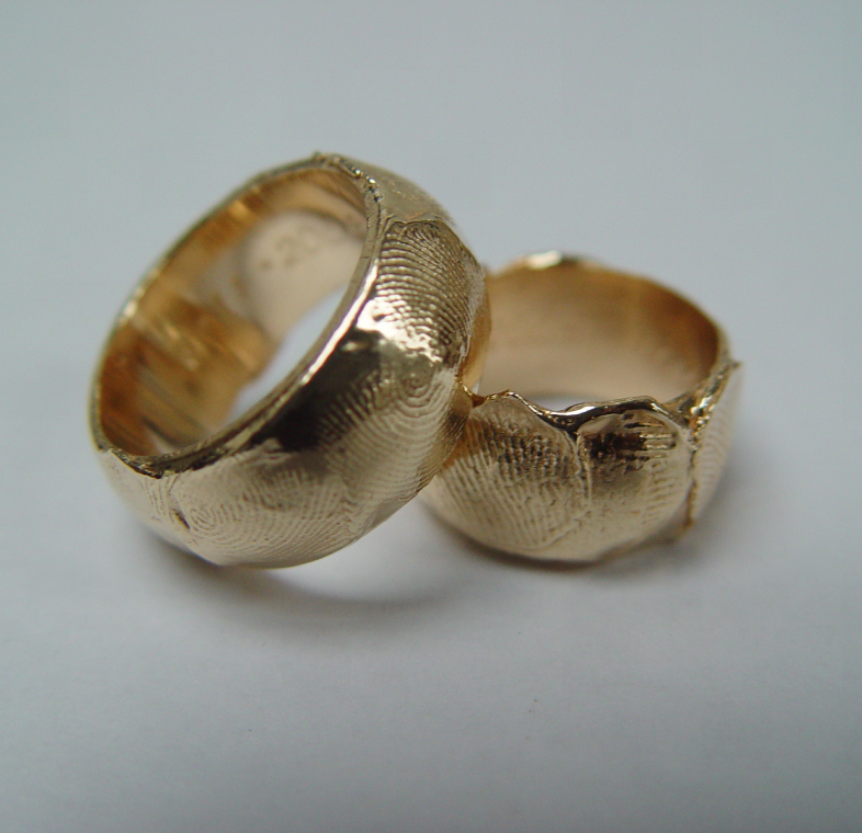 Two gold rings with unique texture